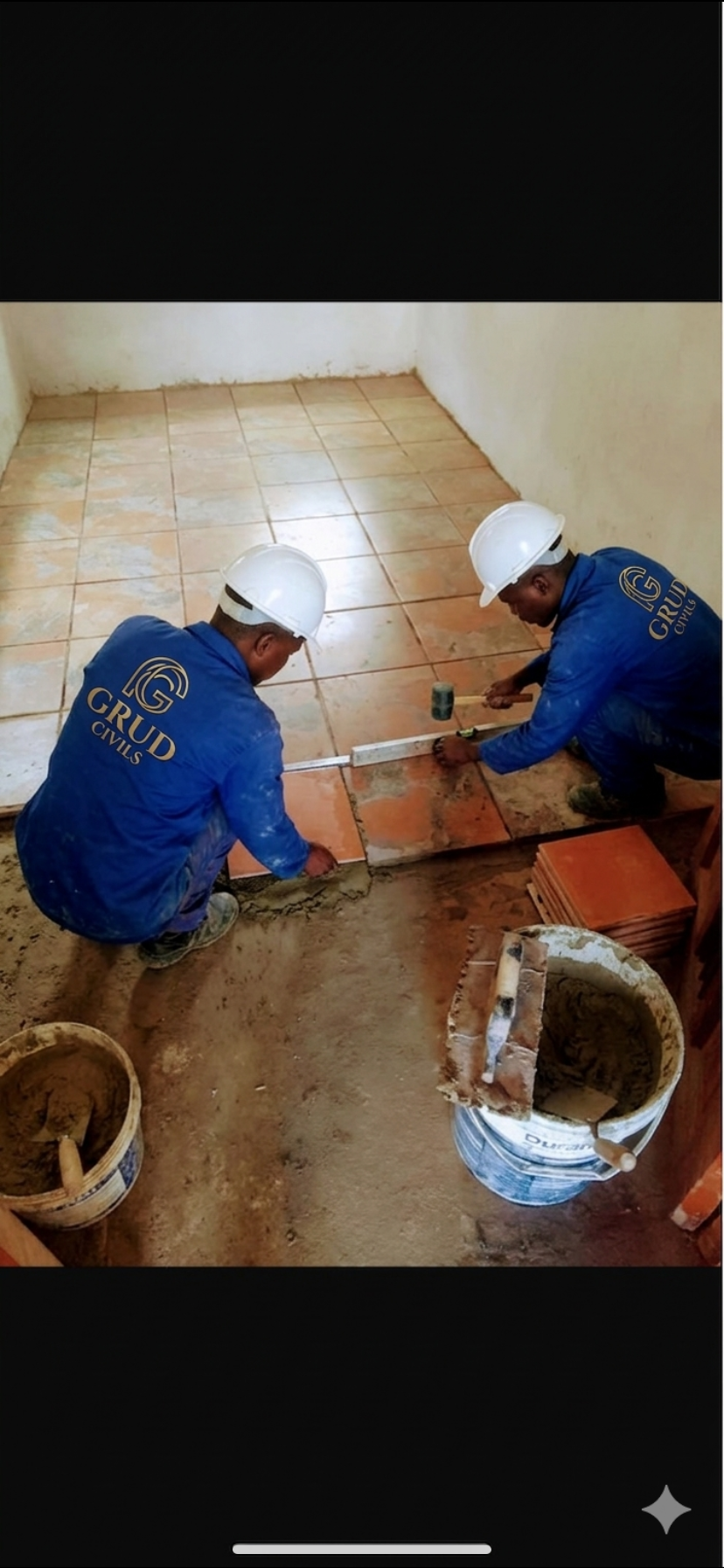 GRUD CIVILS crew laying tiles on site